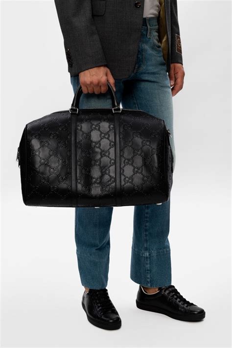 gucci hold all|Gucci holdall for men.